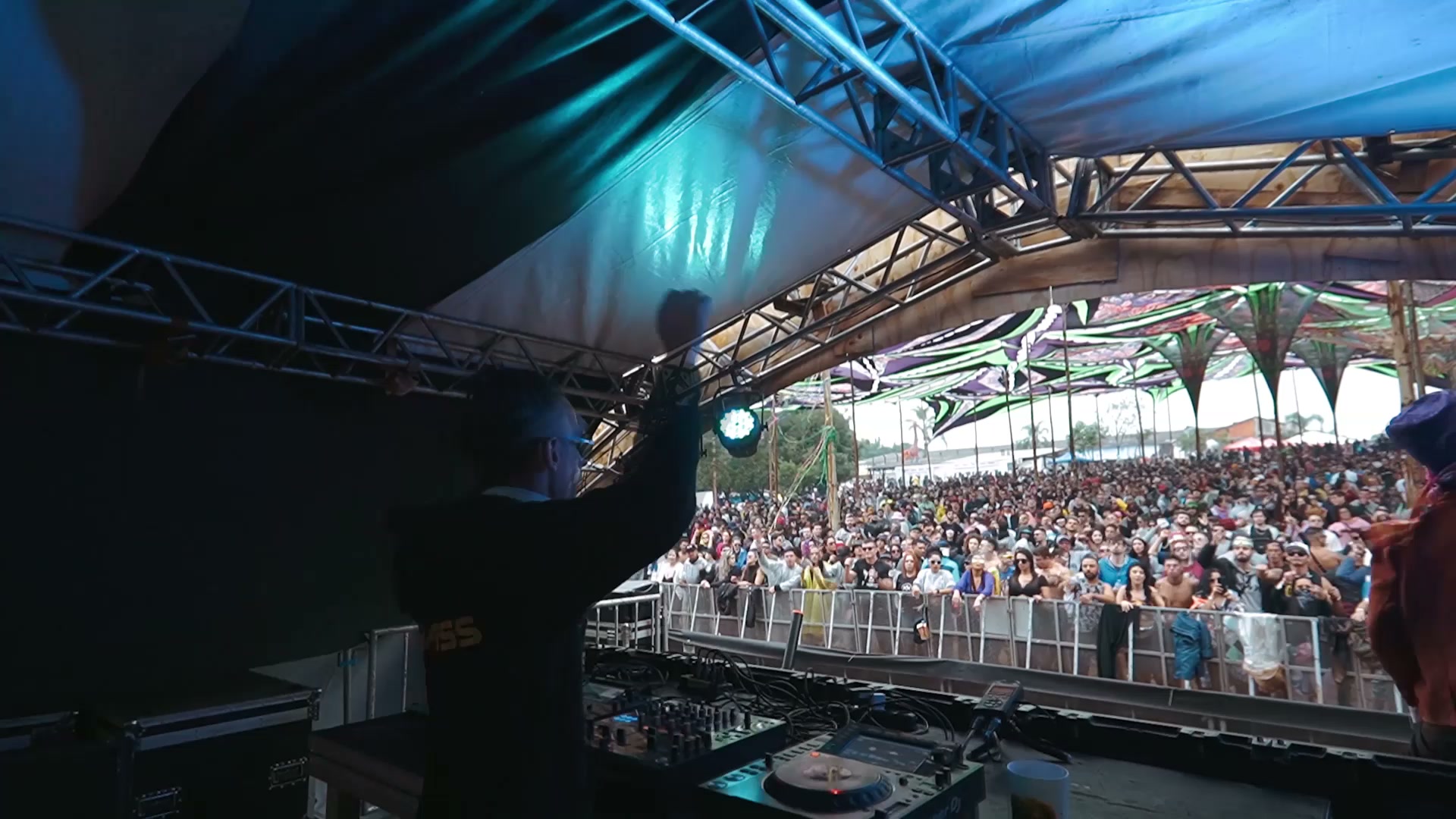 ShiBass performing in front of a large festival crowd